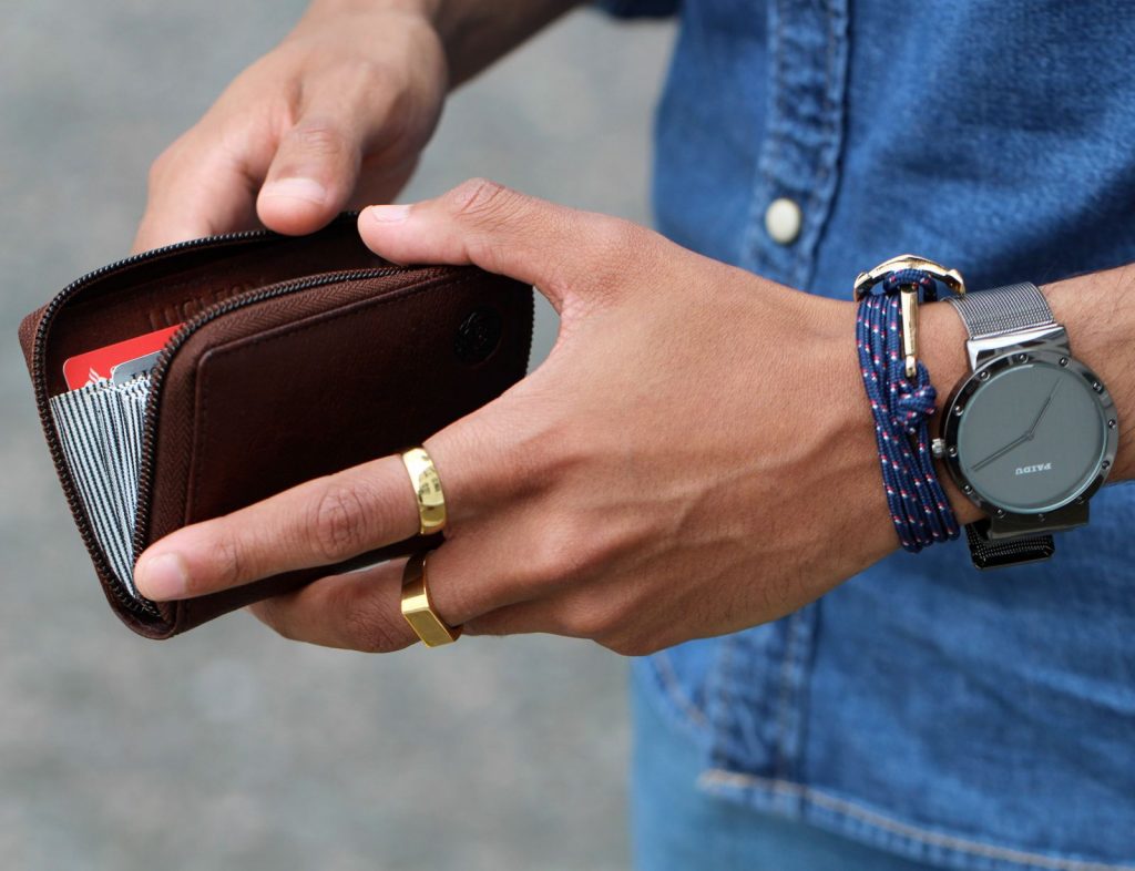 man-with-cardholder-bracelet-and-watch-1600